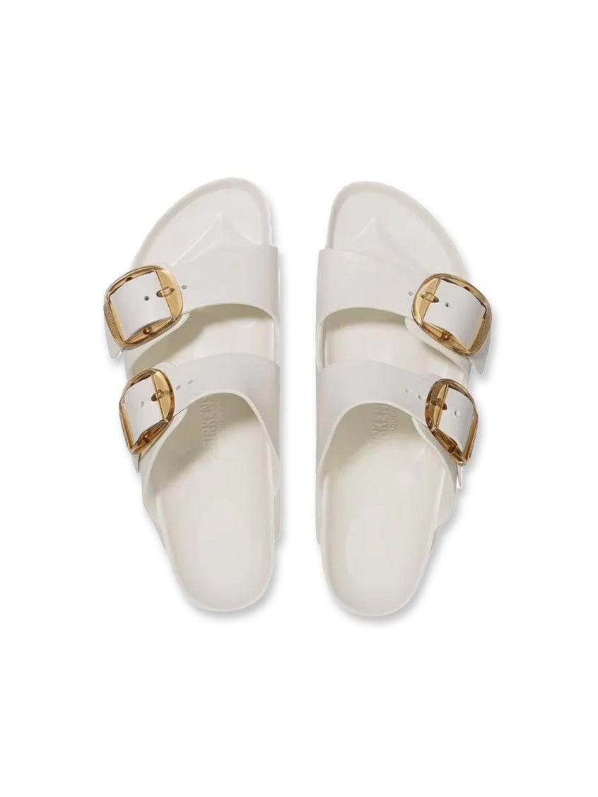 White sandals with big buckles