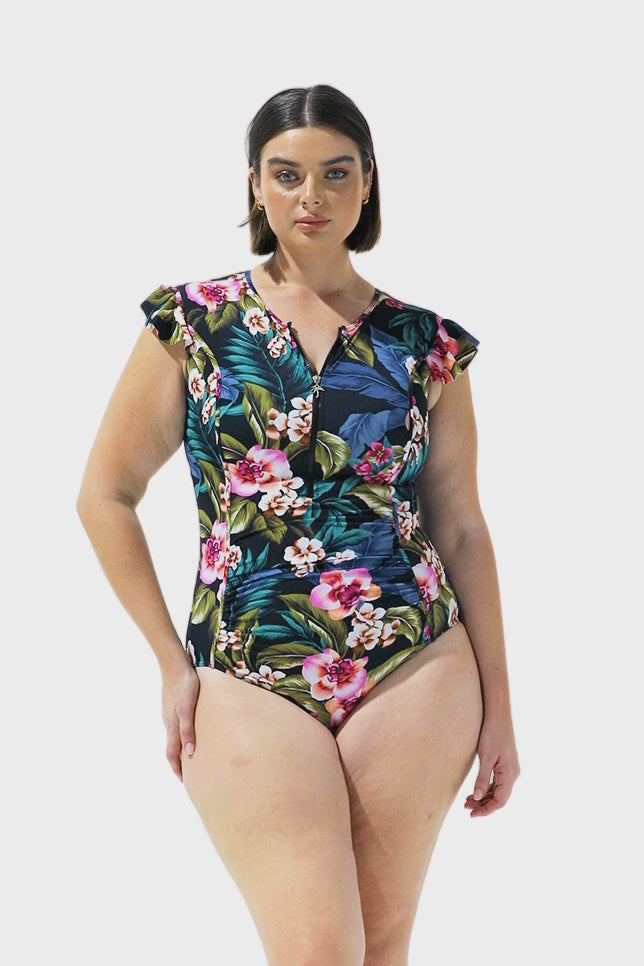 Video of plus size model wearing high neck one piece swimsuit with zipper