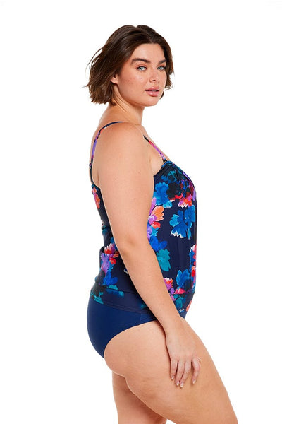 Brunette women wears plus size navy blue and red floral tankini top with removable straps