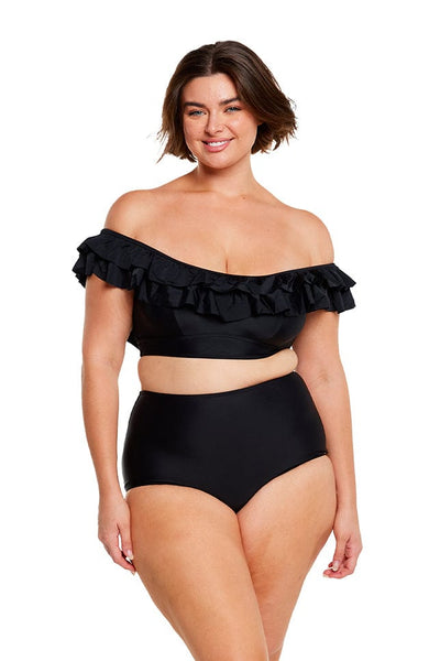 Brunette plus size model wears tummy control high waisted bikini pant