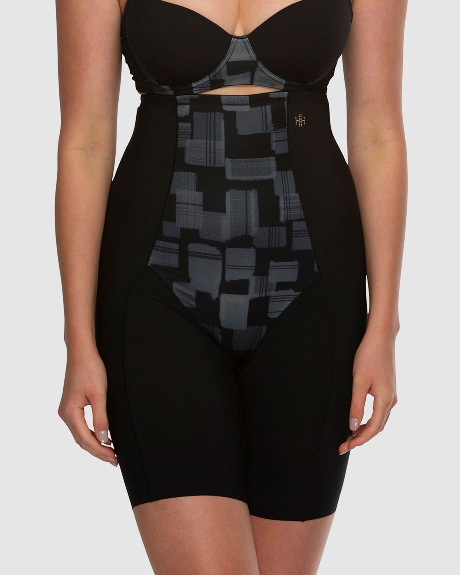 Black shapewear garment with geometric pattern on a white background