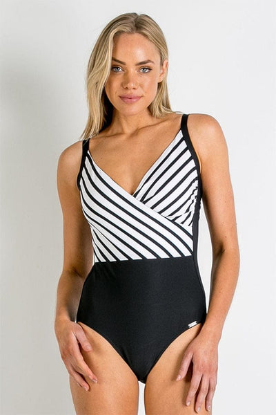 Model wears black and white striped one piece