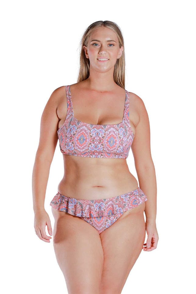 Model wearing pink printed fill top bikini pant 
