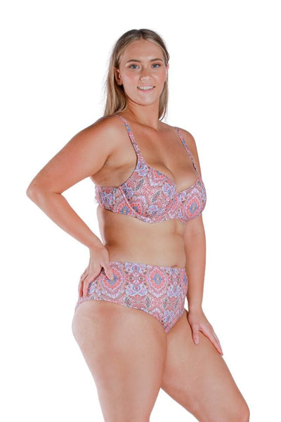 Model wearing pink printed underwire shaped cup bikini top
