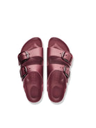 A pair of deep burgundy double-strap slide sandals with silver buckle details, shown from a top-down view on a white background.