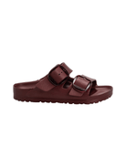 A single burgundy double-strap slide sandal with adjustable buckle straps, shown in profile against a plain white background.