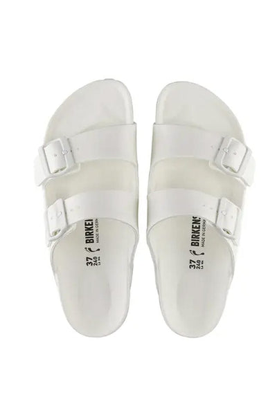 overview image of white rubber beach sandal with 2 adjustable straps over the arch of the foot