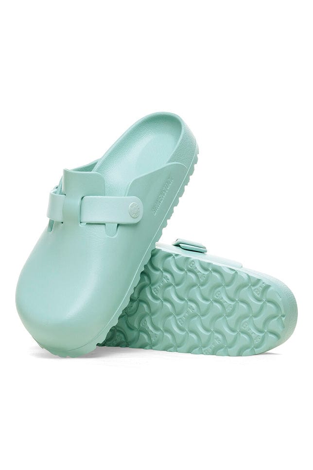 Green coloured covered toe beach slides for women in rubber