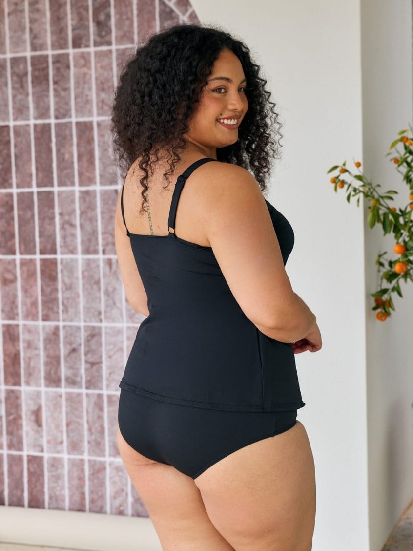 Back of model showing off tank tankin top in chlorine resistant with adjustable straps