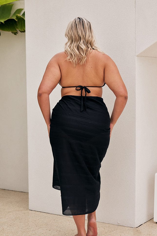 Model showing back of long black sarong