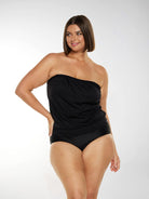 Brunette plus size model wears black bandeau tankini top with removable straps