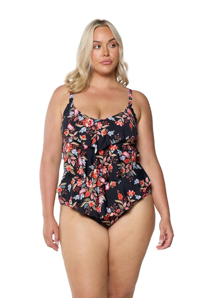 Model in studio wearing multi coloured floral print swimsuit with black base