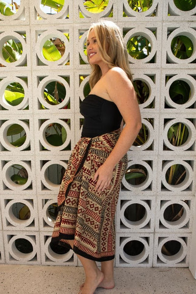 side profile of model wearing a aztec printed plus size sarong