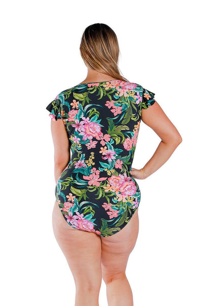 Model wearing floral and black zip front frill sleeved one piece