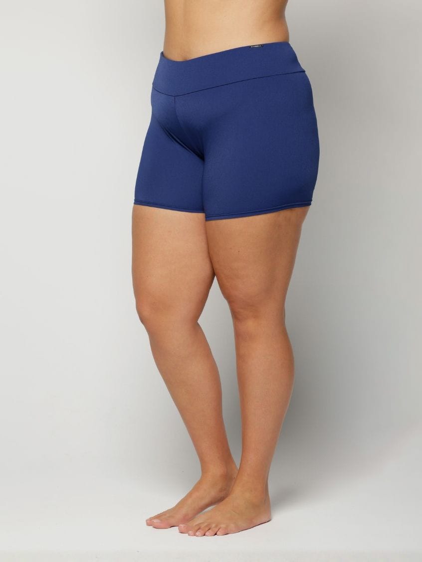 Blue chlorine resistant worn by a person on a plain background