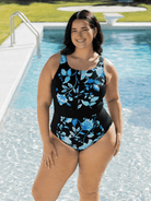Woman wearing a zip front one piece chlorine resistant in blue and black