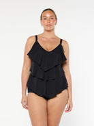 Blonde model wears 3 tier tankini top with chlorine resistant fabric