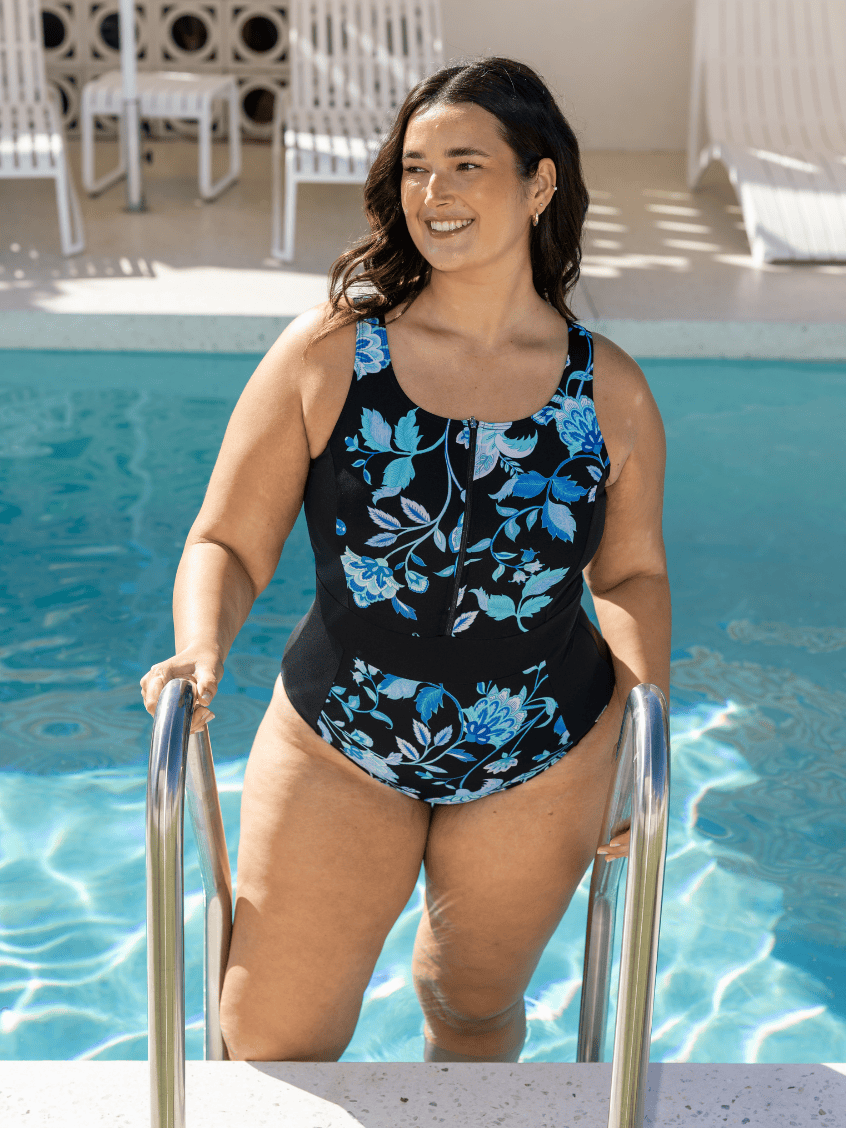 Woman ina  chlorine resistant zip front one piece