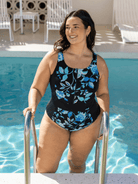 Woman ina  chlorine resistant zip front one piece
