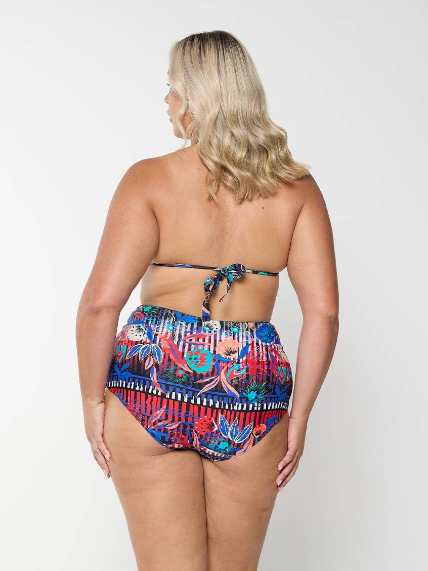 Back of model wearing tie up bikini top for curve women