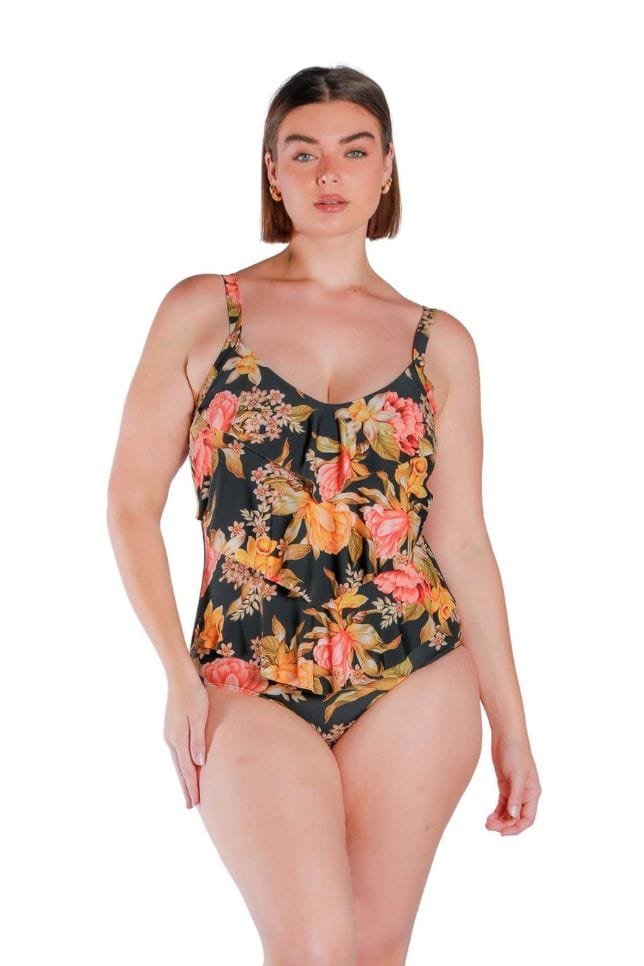 Model wearing yellow, orange and black printed 3 tier one piece