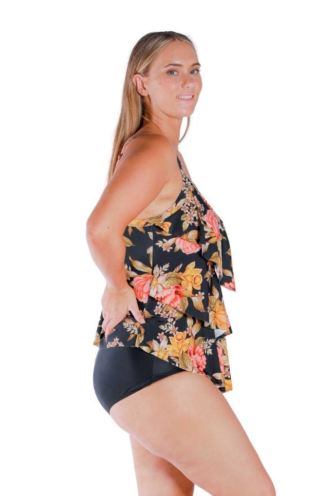 Side of curve model wearing a swim tankini top with ruffle detail in colourful floral print