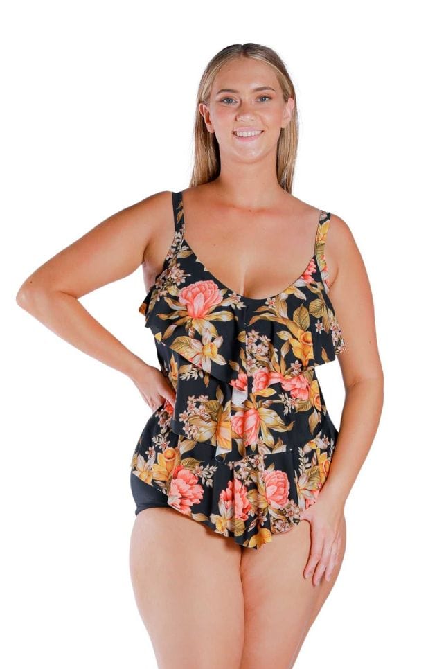Model wearing floral and black printed three tier tankini top