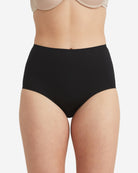 Black high-waisted underwear worn by a person on a white background