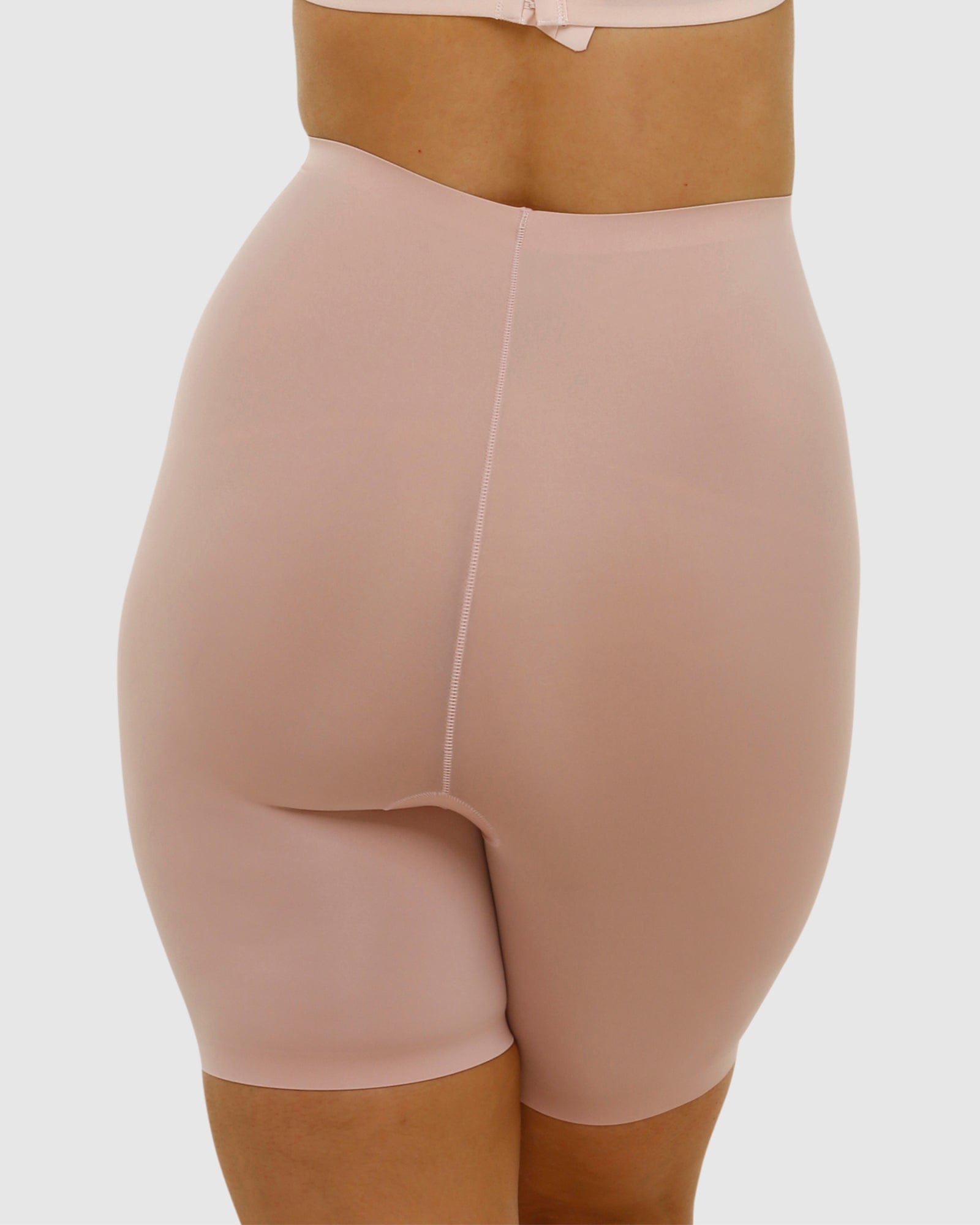 Beige shapewear garment on a white background