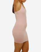 Light pink bodycon dress worn by a person on a white background
