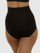 Black high-waisted underwear on a plain background