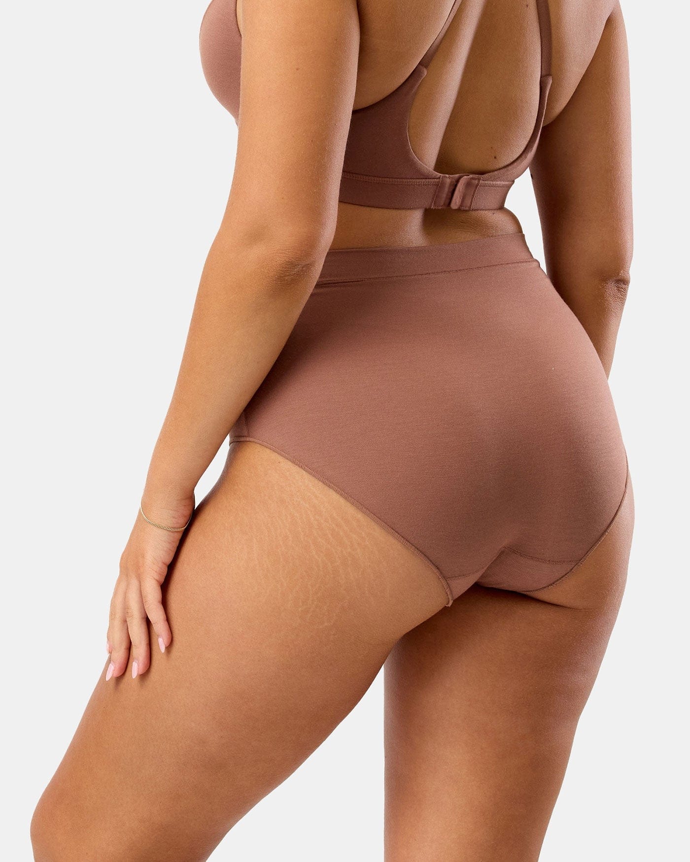 Brown bikini set on a white background