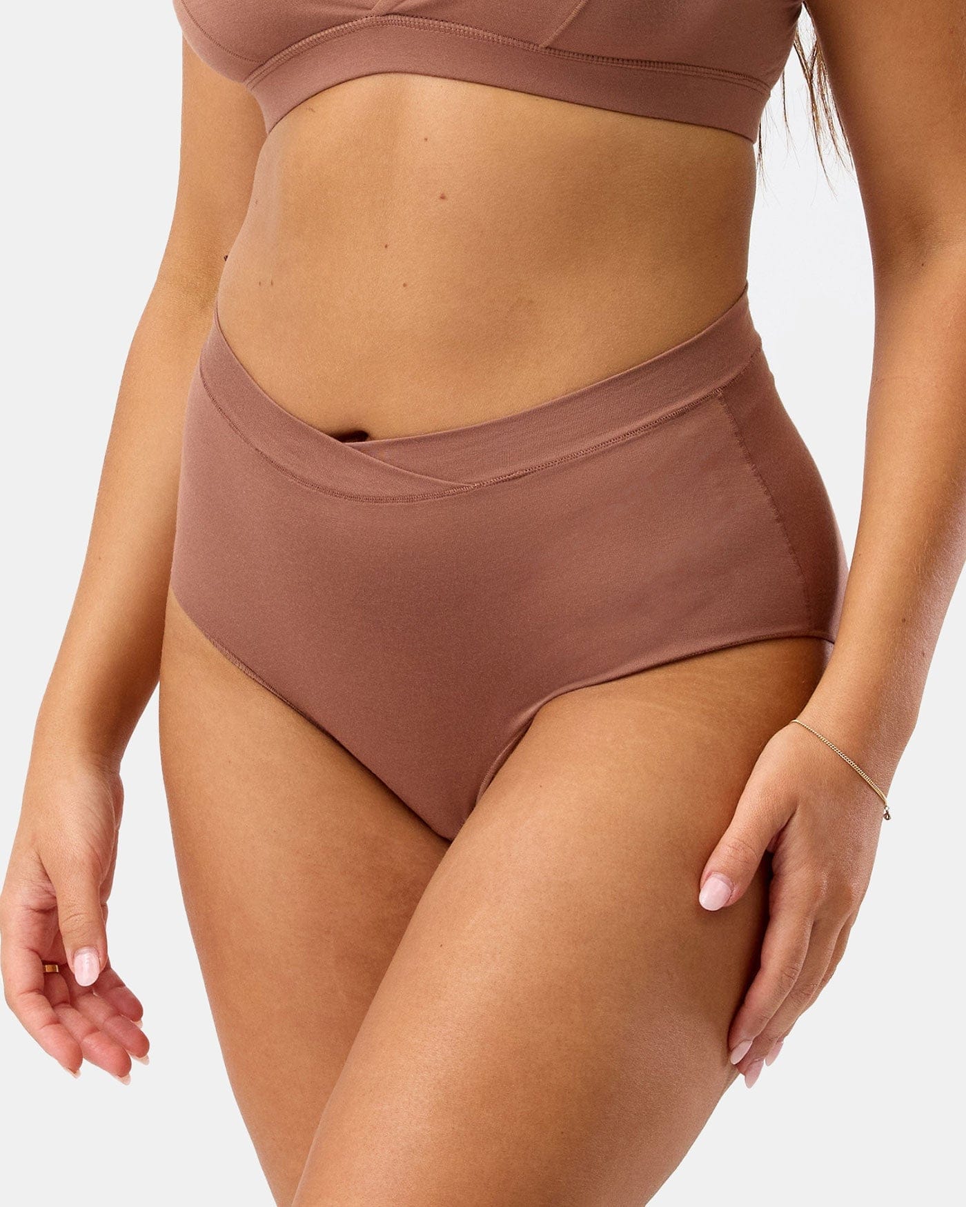 Brown high-waisted bikini bottom on a white background
