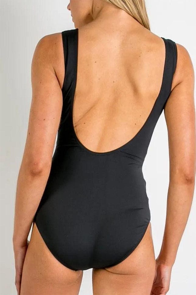 Model with low back black swimsuit