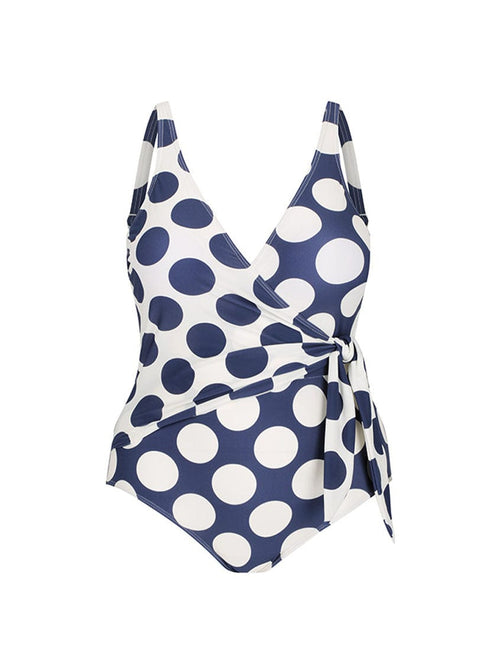 Ghost mannequin of womens large polkadot one piece with crossover detail