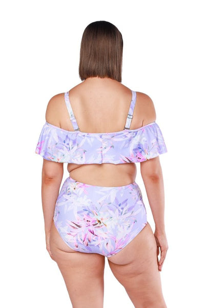 Brunette model wearing cute floral ruffle detail bikini top in purple tones with removable straps