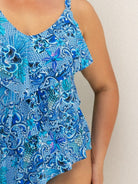 Blue patterned swimsuit on a neutral background