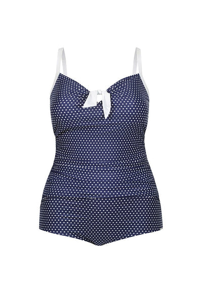 ghost mannequin of navy and white polkadot retro boyleg style on piece with white straps and bow front detail