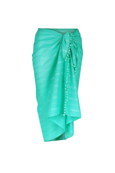 ghost mannequin image of a jade green cotton sarong with pompom details