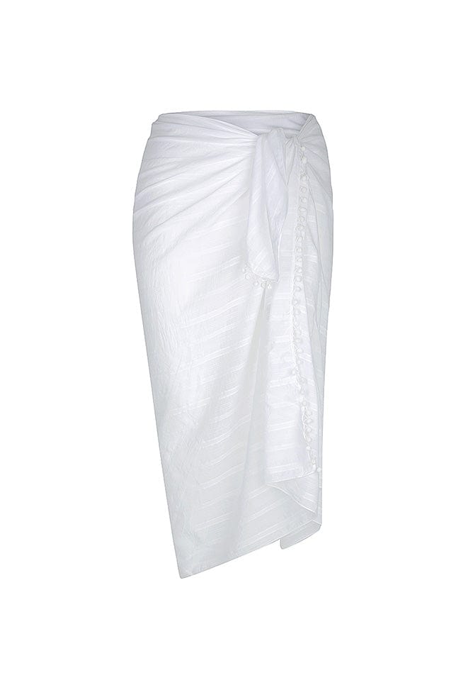 ghost mannequin image of white cotton sarong with pompom details on the ends