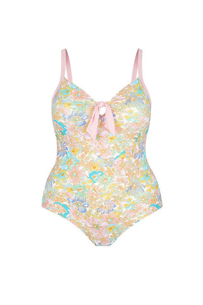 ghost mannequin image of pastel pink and blue floral swimsuit with pale pink straps and bow front detail