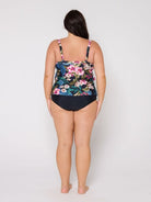 Back of woman wearing a multi coloured tankini top in studio with floral print and adjustable straps