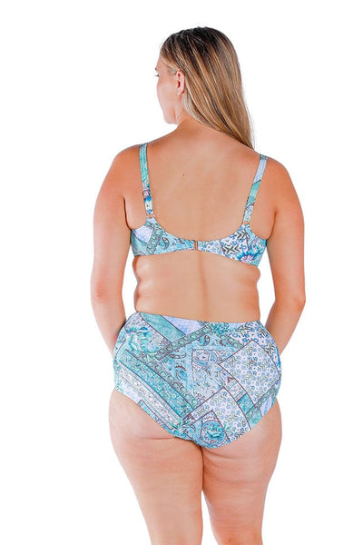 Blonde model showing back of blue womens swim pant