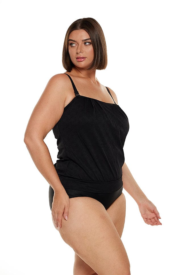 plus size brunette women wears black textured tankini top with removable straps
