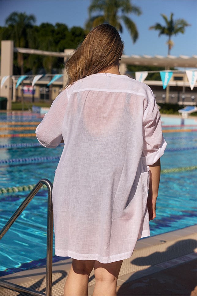 Model showing back of white cover up dress