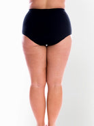 Back of model in studio wearing high waisted chlorine resistant pant