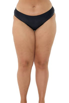 model wearing black hipster bikini bottoms