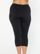 model showing back of black chlorine resistant swim tights