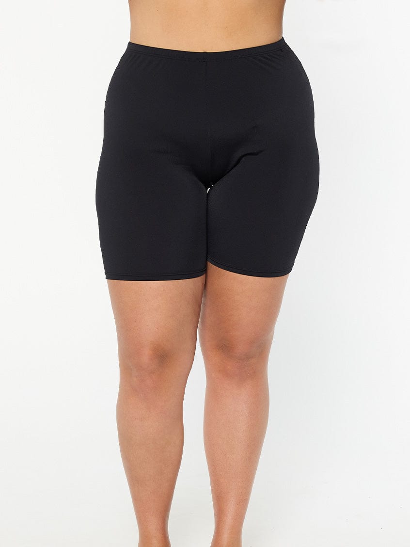 model wearing black chlorine resistant bike pant