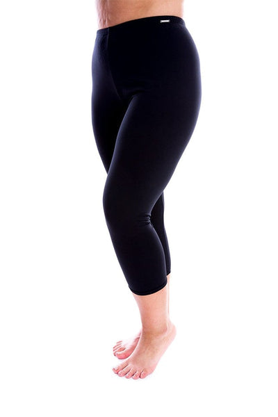 Model wearing chlorine resistant three quarter swim pants